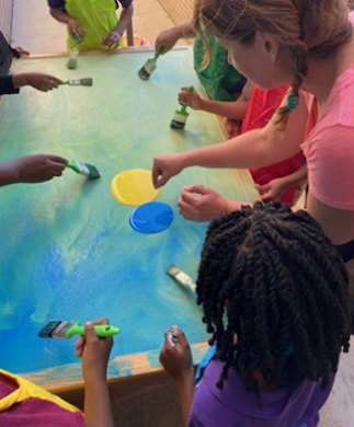 Photo of students working on an art project 